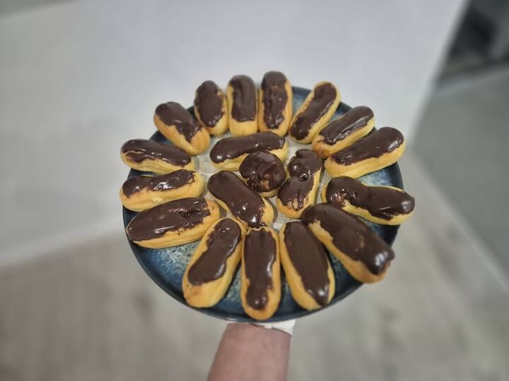 Chocolate glazed éclairs prepared during the experience